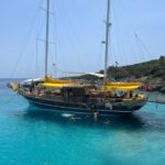 Bodrum: Orak Island Boat Trip with Lunch & Optional Transfer - Scenic Boat Ride and Sunbathing in Bodrum