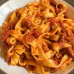 Bologna: Full meal Food Tour with Local Delights by Do Eat Better - Second Stop: Bologna’s Signature Snacks – Tigelle and Mortadella