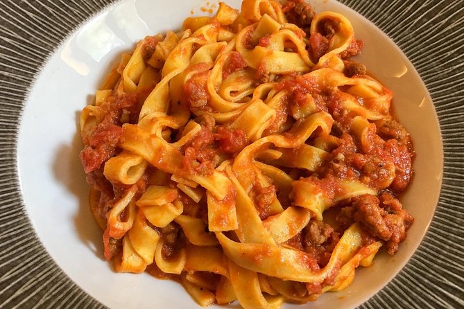 Bologna: Full meal Food Tour with Local Delights by Do Eat Better - Second Stop: Bologna’s Signature Snacks – Tigelle and Mortadella