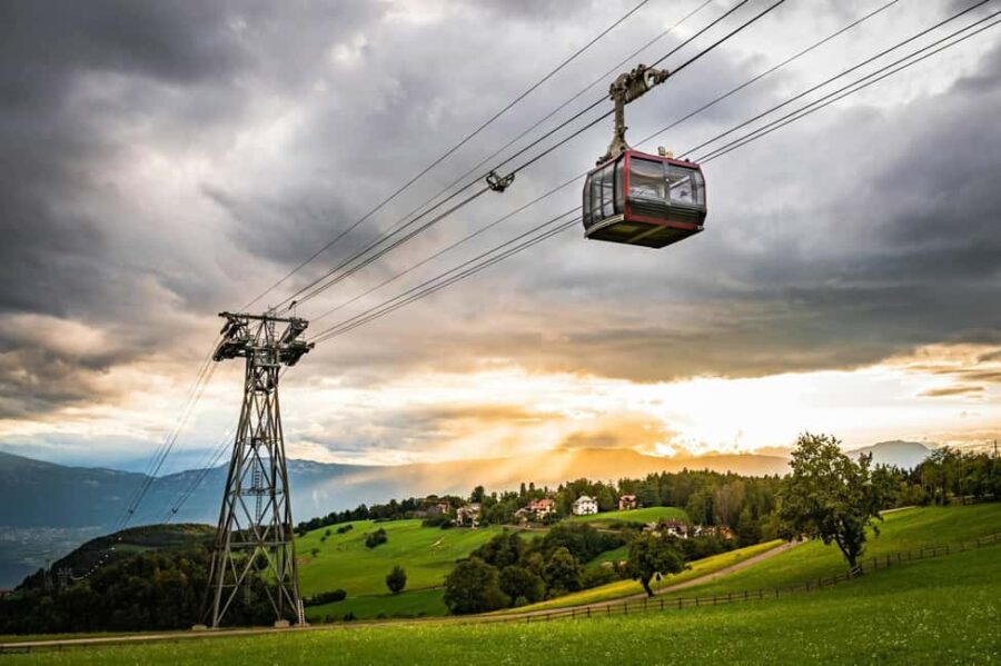 Bolzano and Renon Tour with Panoramic Train Ride - Ascending to the Renon Plateau via Cable Car