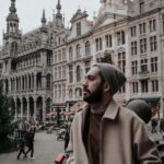 Brussels on Foot: Historic Center and Christmas Markets with a Local Guide - Exploring the Legend of Manneken Pis and His Festive Outfits