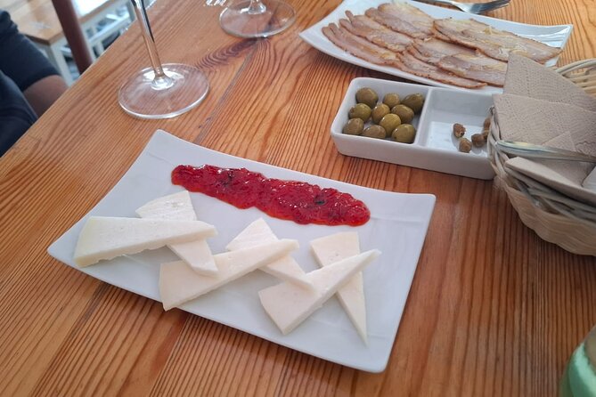 Cadiz Food Tour: Tapas, Drinks and Delights with a Local - Visiting the Roman Theater and Tasting Chicharrón