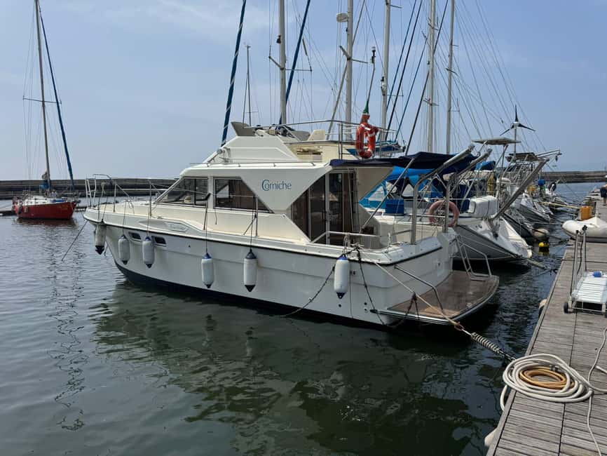 Cagliari: boat party with drinks and a view of the Devil's Saddle - The Setting: Cagliari’s Coastline and the Gulf of Angels
