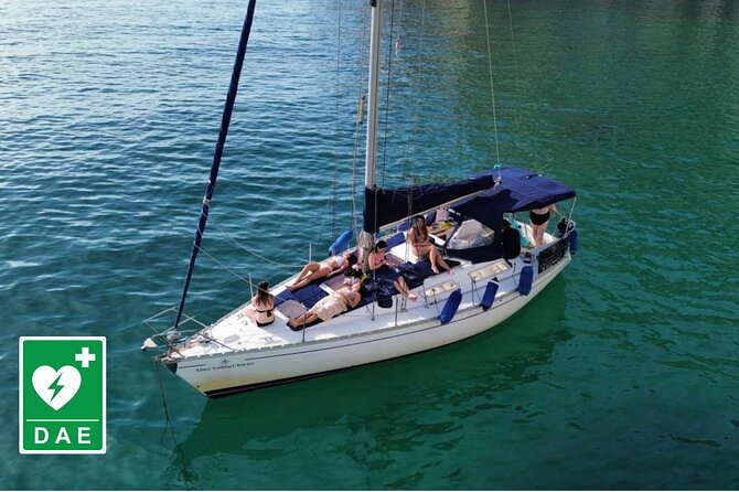 Cagliari: Sailing tour with 4 stops, snorkeling and Prosecco - Exploring the Bay of Capo SantElia and Military Heritage