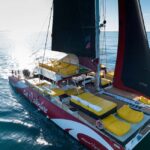 Cambrils: 1-hour catamaran cruise with a Balinese bed and a drink - Experience on the CAT AVENTURE Catamaran