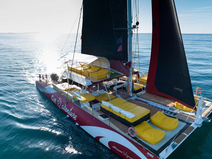 Cambrils: 1-hour catamaran cruise with a Balinese bed and a drink - Experience on the CAT AVENTURE Catamaran