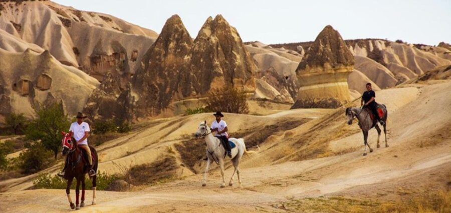 Cappadocia: Horse Riding Tour Sunset or Day Time with Pickup - Exploring Sword Valley: Towering Sandstone and Unique Rock Pillars