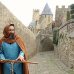 Carcassonne: Medieval Builder-Themed City Tour with a Guide - The Meeting Point in Front of Dame Carcassonne at Porte Narbonnaise