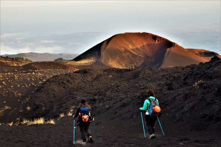 Catania: Etna Morning or Sunset Trek with Lava Tunnel & Gear - Inside the Lava Tunnel: An Underground Experience