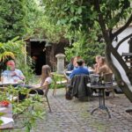 Cologne-Nippes: Summer wine party in the frenchstyle garden - Starting Point and Meeting Details at Le Caveau Wine Shop
