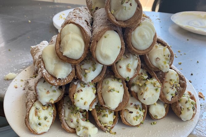 Cook, discover sights, taste food & wine with a chef in Syracuse - Exploring Ortigia Market with a Local Food Expert