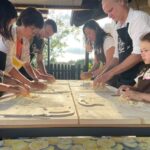 Cooking class, dinner and wine tasting in Lecce (Corigliano) - Enjoying the Veranda Aperitif and the Warm Indoor Dining Space