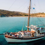 Corfu: Blue Lagoon and Cave Cruise with Drinks and Lunch - The Charm of the Wooden Sailboat ODYSEIA