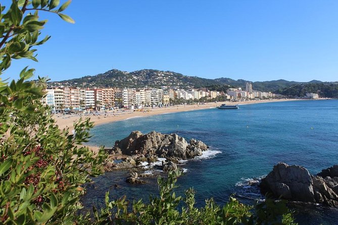Costa Brava Day Tour with Boat Trip from Barcelona - Visiting Lloret de Mar: The Coastal Hub with a Colorful Atmosphere
