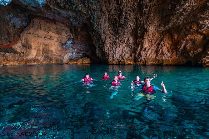 Cova dels Orguens: Cave Exploring Kayak & Snorkel Tour in Javea - Paddling Past Cap Negre: A Dramatic Seaside Monolith