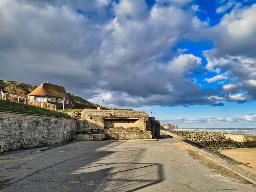 D-day: Omaha Beach tour with transportation from Bayeux - Visiting Pointe du Hoc: The Daring Cliffs and Bombed Landscape