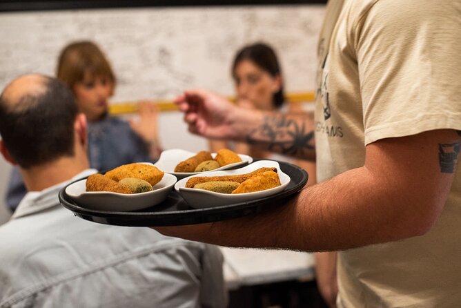 Devour Lisbon Food & Fado Tour Mouraria & Alfama Neighbourhoods - Tasting Portuguese Petiscos at a Historic Venue