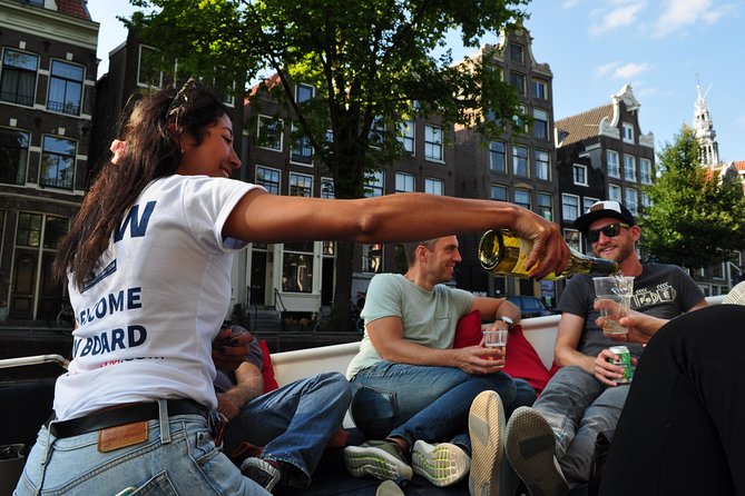 Discover Amsterdam's Canals: Relaxing Open Boat Cruise Adventure! - Drinks and Refreshments Included During the Cruise