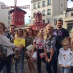 Discover Montmartre and visit the Basilica of Sacré-Coeur - See the Famous Exterior of Moulin Rouge and Its Historic Significance