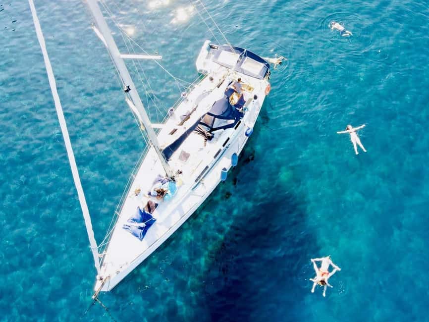 Discover the magic of sailing: a boat tour in Catania - Navigating the Ulysses Caves Snorkeling Stop