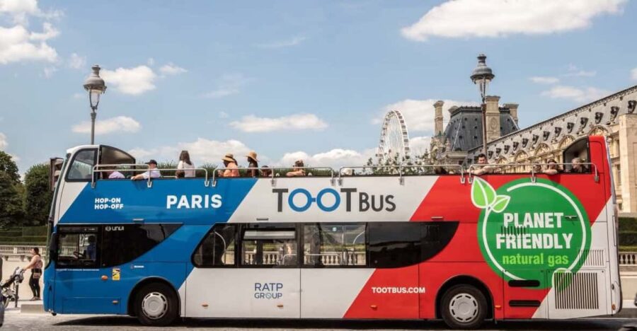 Disneyland Paris: Bus Sightseeing Tour in Paris - Arrival at the Iconic Eiffel Tower Sets the Scene