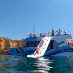 Dolphin Watching Half-Day Cruise from Lagos - Scenic Coastline Views and Famous Landmarks