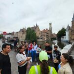 Evening Delights: Bruges Tour with Beer & Chocolate - Starting the Night Tour at Fnac and Meeting the Guide