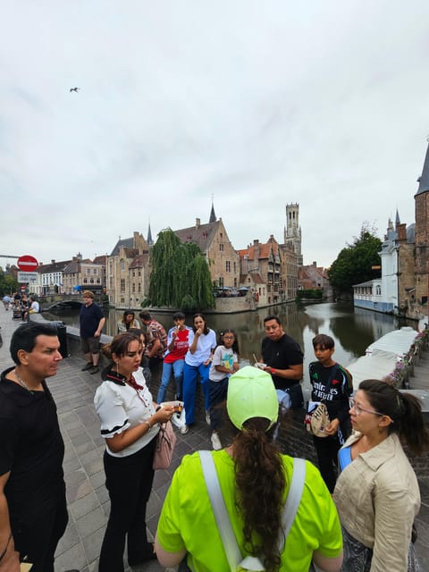 Evening Delights: Bruges Tour with Beer & Chocolate - Starting the Night Tour at Fnac and Meeting the Guide