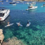 Experience Crystal paddle surf Tours + snorkel - Exploring Ibiza’s Sea Caves and Rocky Coastlines