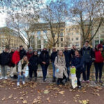 Explore Düsseldorf with Passionate tour guides! - Starting Point at the Leonidas Store with a Red Umbrella