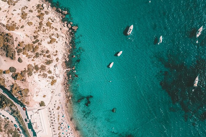 Explore Formentera with a Full-Day Private Sailboat Trip - Es Pujols and the Cliff-Jumping Adventures