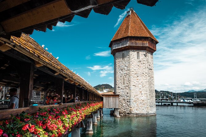 Explore Lucerne in 60 minutes with a Local - Strolling Across the Spreuerbrücke and Its Medieval Art