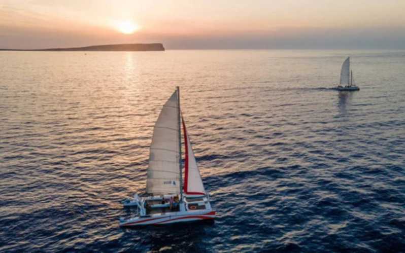 Fornells: Catamaran Sunset Cruise of Menorca's Coast - Sailing Out from Fornells Village