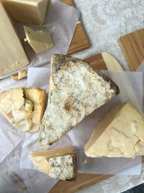 French Cheese Walk: Visit 4 artisan cheese shops - Comparing Brie and Camembert at Pont Saint-Louis