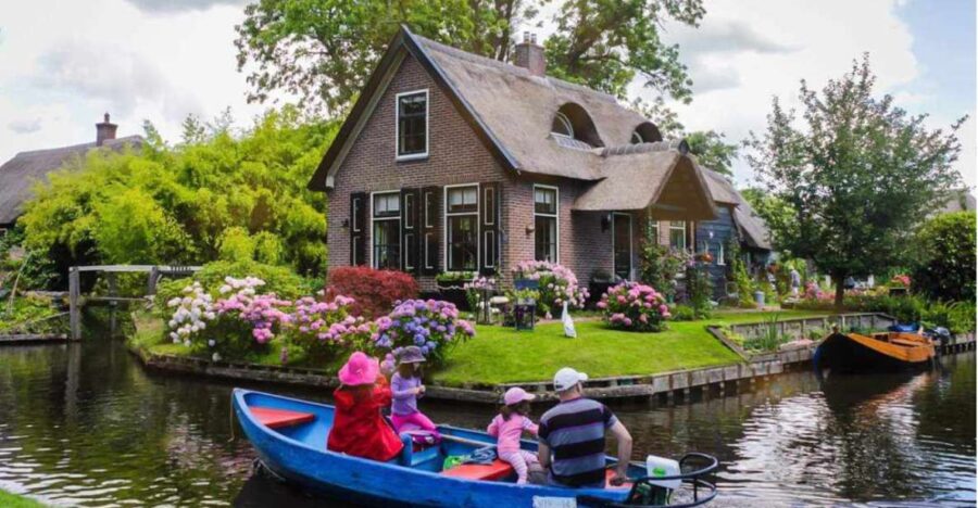 From Amsterdam: Giethoorn Guided Day Trip with Canal Cruise - From the Meeting Point in Amsterdam to the Scenic Village