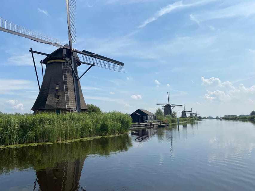 From Amsterdam: Kinderdijk, Delft & Mauritshuis Private Tour - Enjoy a Traditional Lunch in a Historic Canal House