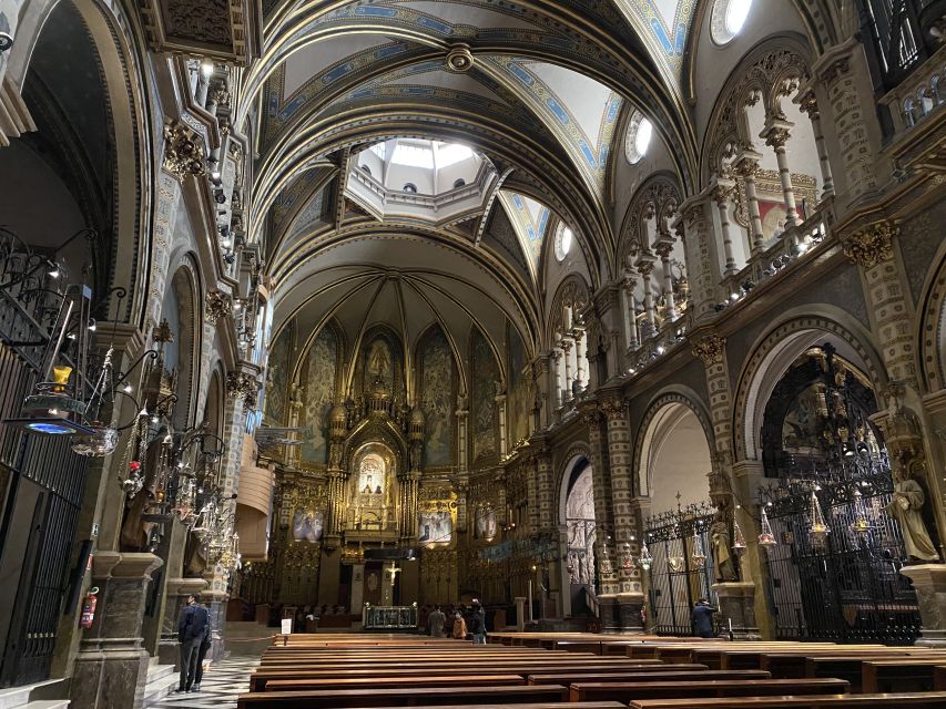 From Barcelona: Montserrat Mountain Hike and Abbey Tour - Exploring Montserrat Abbey and the Black Madonna