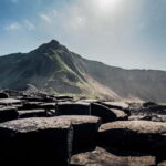 From Belfast: Giants Causeway Express Half-Day Tour - Exploring the Giants Causeway: Hexagonal Rocks and Mythology