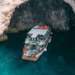 From Benitses/Lefkimmi: Blue Lagoon & Papanikolis Cruise - Departure Points and Schedule for the Boat Cruise