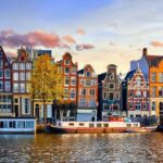 From Brussels: Day Trip to Amsterdam with Canal Boat Cruise - Discovering the Old Town and Merchant Houses