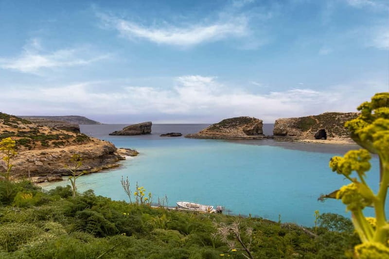 From Bugibba: Comino Blue Lagoon Return Trip (CMO) - Exploring Maltas Coastal Cliffs, Sea Caves, and Grottoes