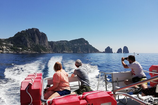 From Capri Guided Tour with Faraglioni and Grottoes Visit - Starting Point at Marina Grande and the Vibrant Harbor Scene