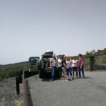 From Catania: Etna & Taormina Day Trip - Exploring a Lava Flow Cave with Helmets and Torches