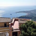 From Catania: White Lotus tour Taormina, Castelmola & Naxos - Castelmola: The Almond Wine Village on the Ionian Coast