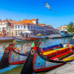 From Coimbra: Tour to Aveiro, Costa Nova beach, and Moliceiro boat ride - Convenient Pickup and Transportation from Coimbra