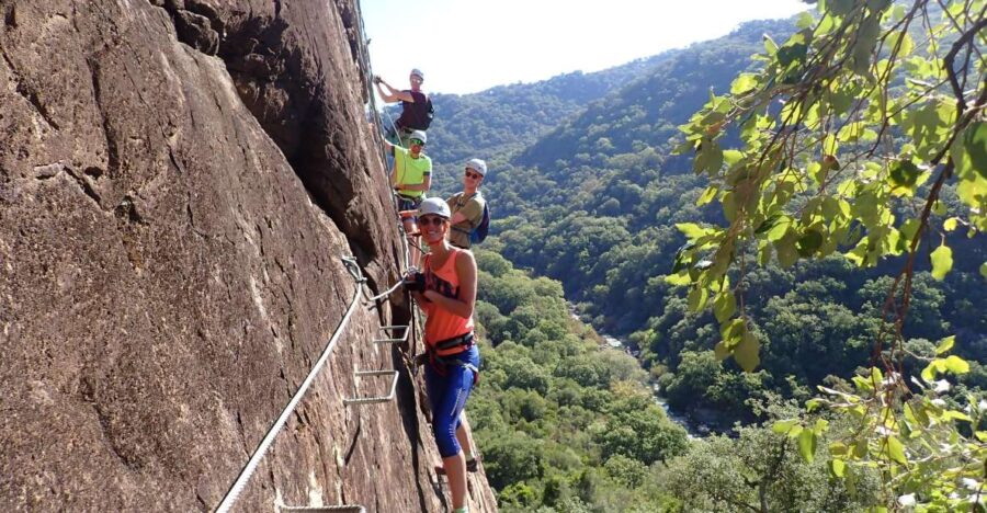 From Estepona: Vía ferrata El Caimán guided climbing tour - Starting Point at Meson Las Flores in Gaucín