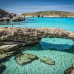 From Gozo:Around Comino, Blue Lagoon, Crystal Lagoon & Caves - Blue Lagoon: The Star Attraction