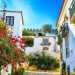 From Lisbon: Nazaré and Óbidos Private Tour in a premium car - Nazaré: The Surfing Legend and Coastal Charm
