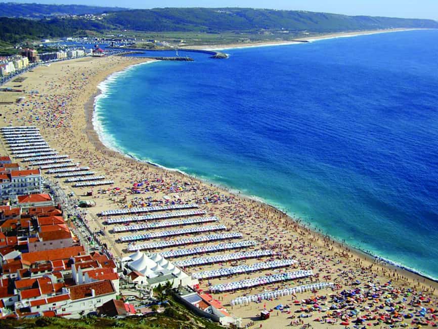 From Lisbon: Óbidos and Nazaré Guided Tour - Nazaré’s Spectacular Waves and Coastal Views