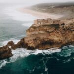 From Lisbon: Óbidos, Nazaré, and Fátima Day Trip - Nazaré’s Famous Waves and Fishing Heritage